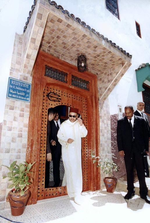 a man in a wedding dress standing in a doorway at Al Andaloussiya Diyafa in Moulay Idriss