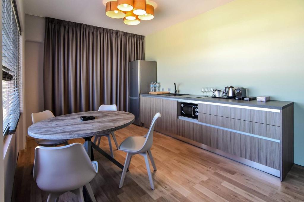 Kuchyň nebo kuchyňský kout v ubytování Kresten Palace Hotel