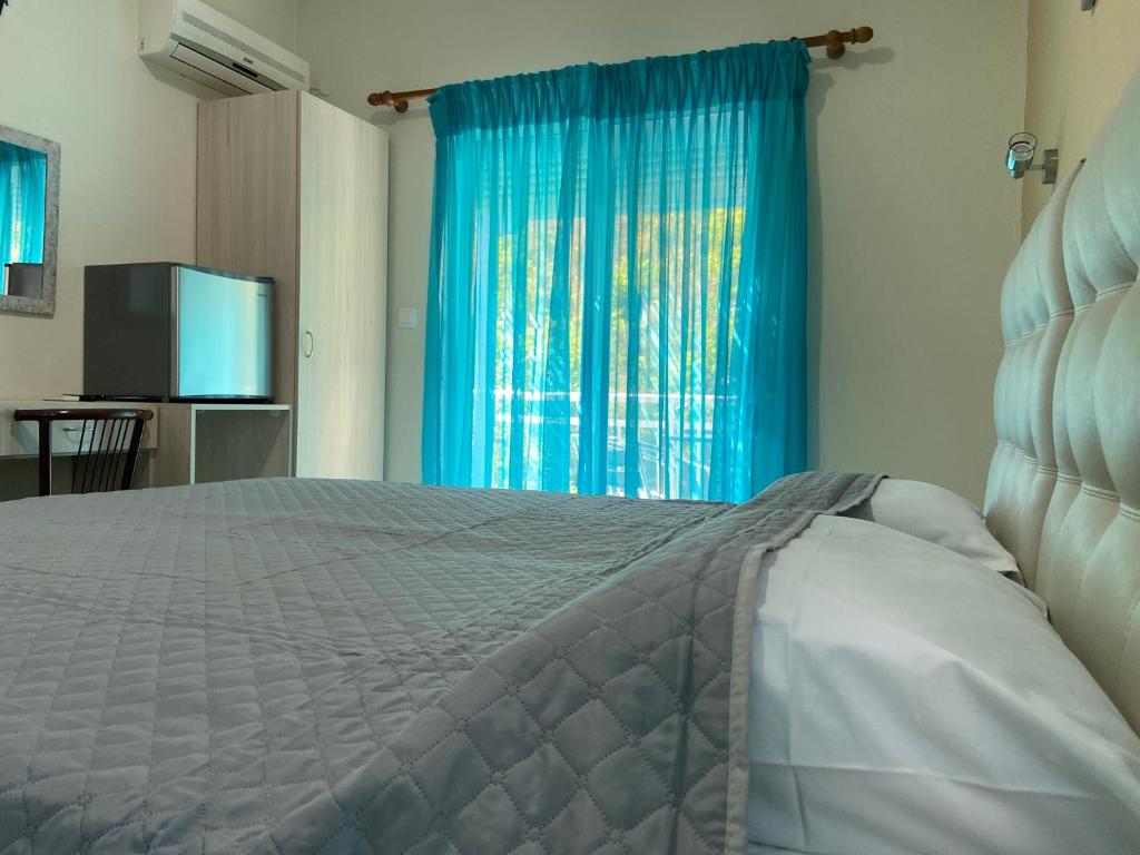 Postel nebo postele na pokoji v ubytování Samothraki Akrogiali Rooms