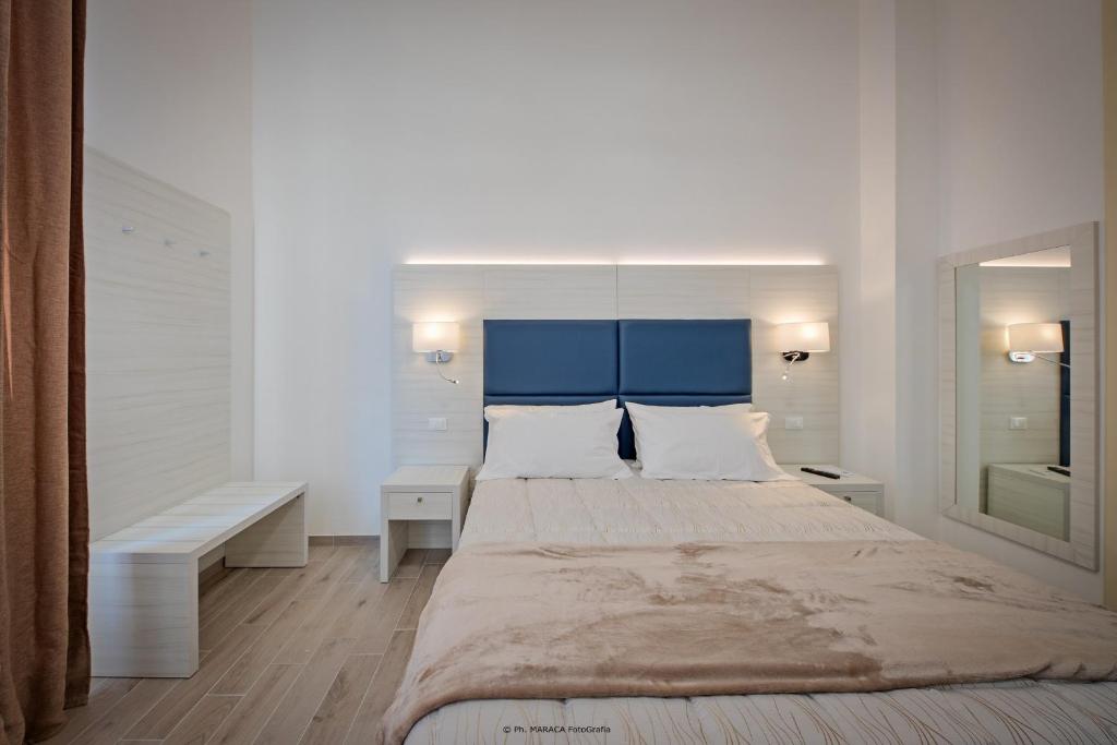 Posteľ alebo postele v izbe v ubytovaní Hotiday Room Collection - Lecce Gianmarti Suite