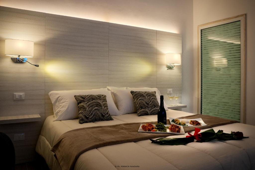 Posteľ alebo postele v izbe v ubytovaní Hotiday Room Collection - Lecce Gianmarti Suite