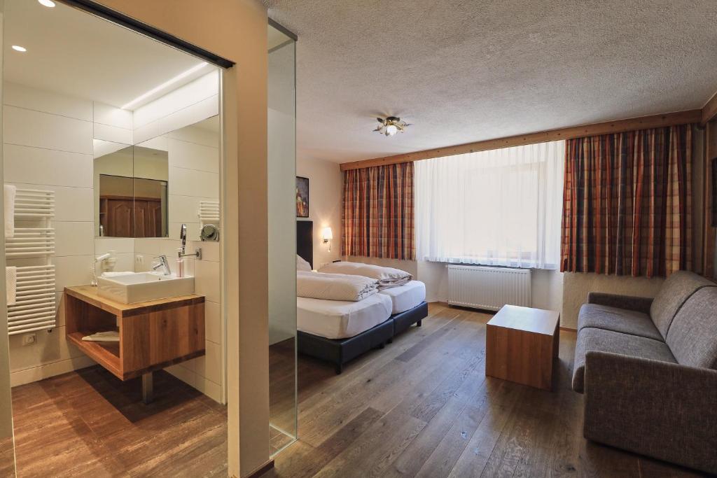 Postel nebo postele na pokoji v ubytování Hotel Traube