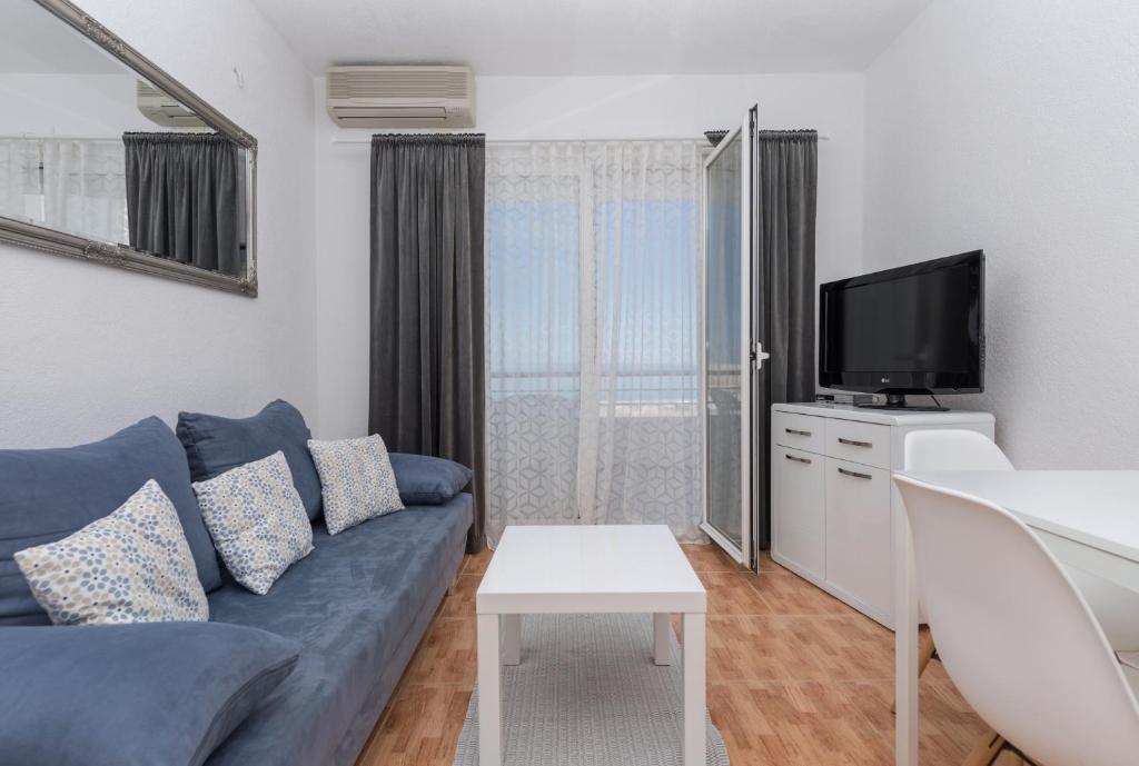 TV a/nebo společenská místnost v ubytování Apartments Tila