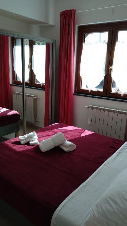 Postel nebo postele na pokoji v ubytování Seven