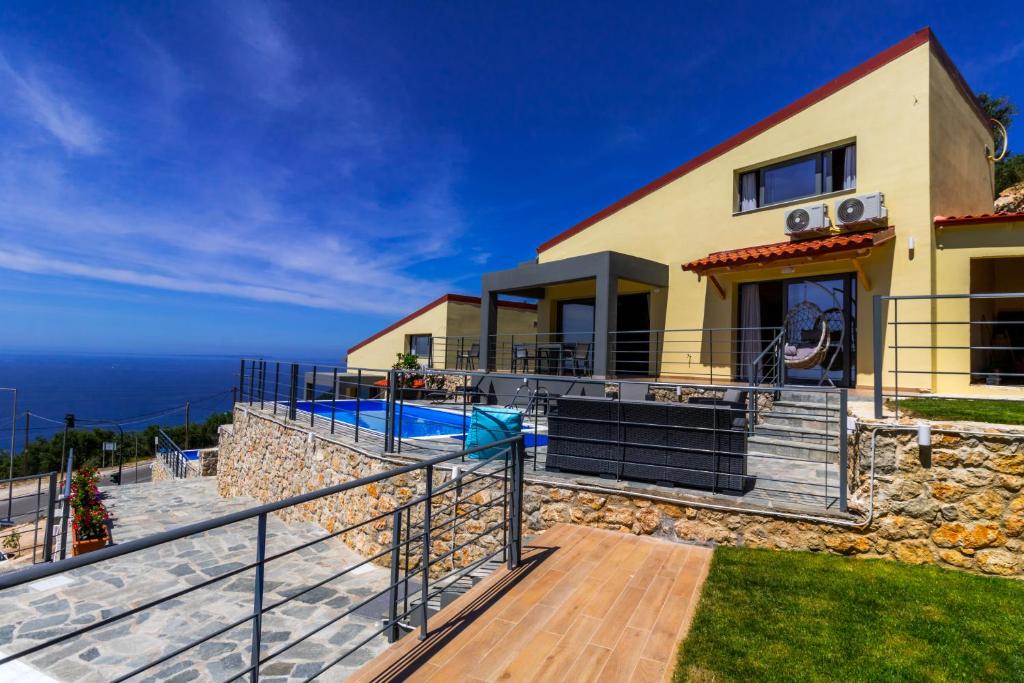 a villa with a view of the ocean at Santakira Villas in Parga