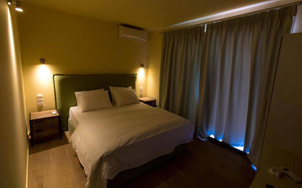 Postel nebo postele na pokoji v ubytování Santakira Villas