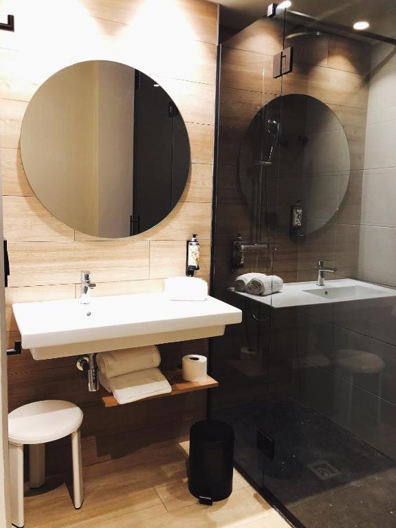 A bathroom at voco Bilbao - City by IHG