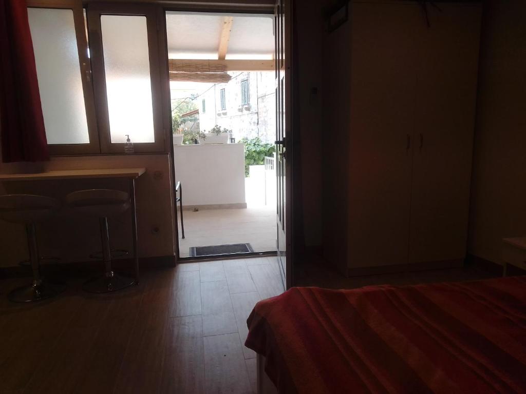 Postel nebo postele na pokoji v ubytování Apartments Haracic