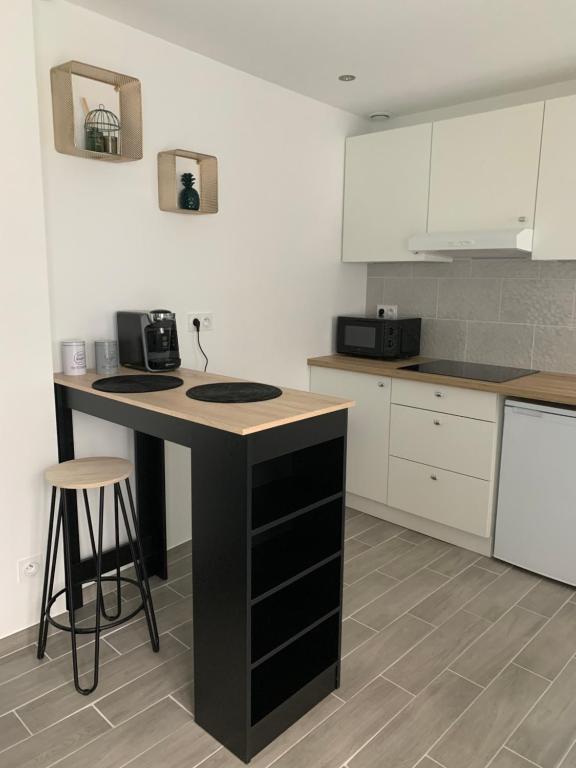 Η κουζίνα ή μικρή κουζίνα στο Maisonnette en hyper centre d’Orléans