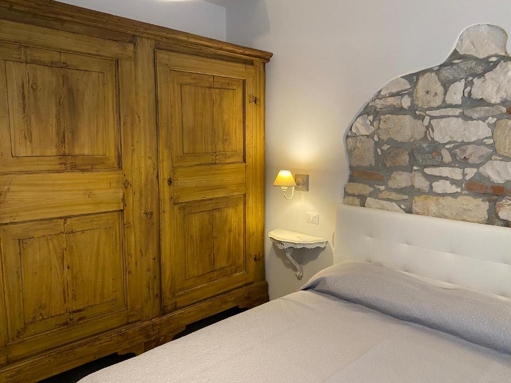 Postel nebo postele na pokoji v ubytování UNIQUE ROOMS