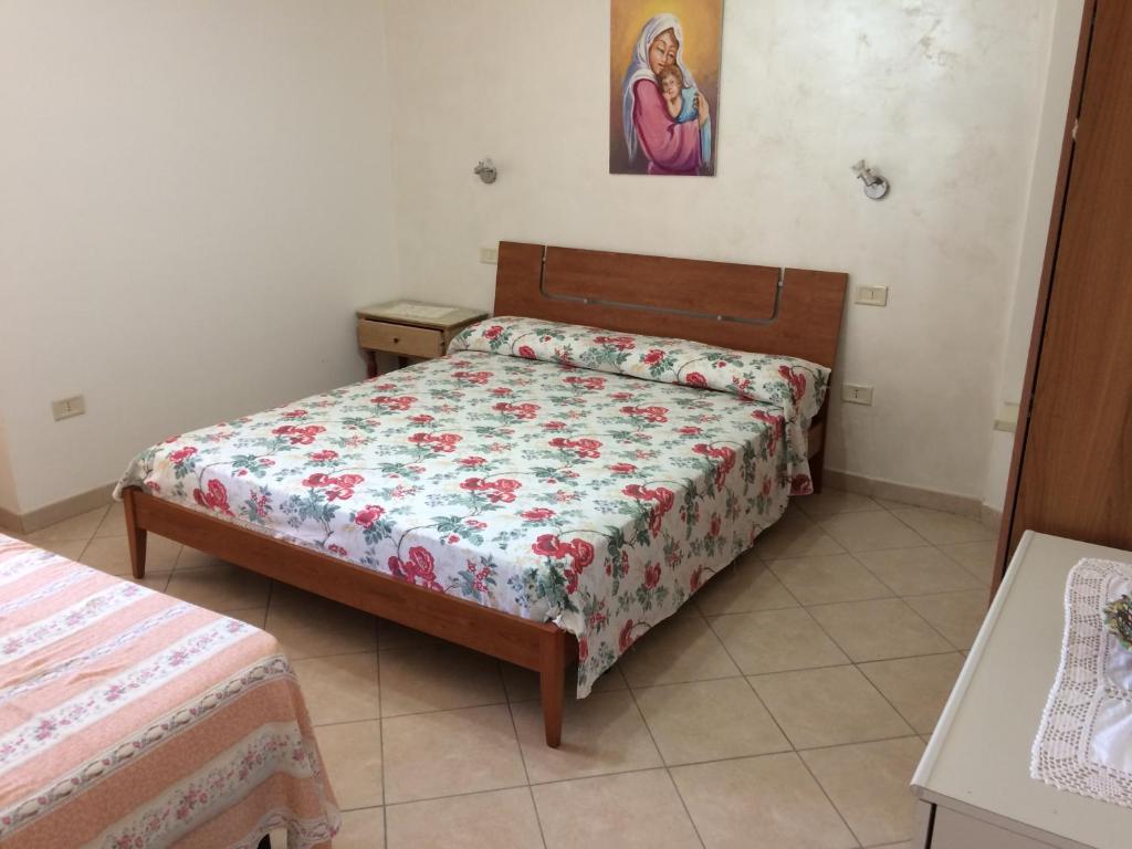 Posteľ alebo postele v izbe v ubytovaní Casa vacanze la tuia