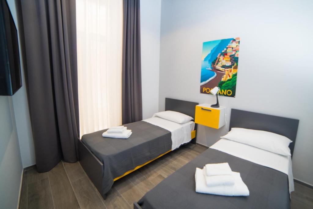 Łóżko lub łóżka w pokoju w obiekcie Casa Felix