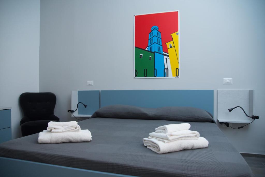 Łóżko lub łóżka w pokoju w obiekcie Casa Felix