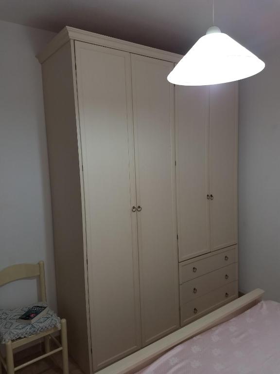 A bed or beds in a room at Appartamenti per vacanze Valle Onesta