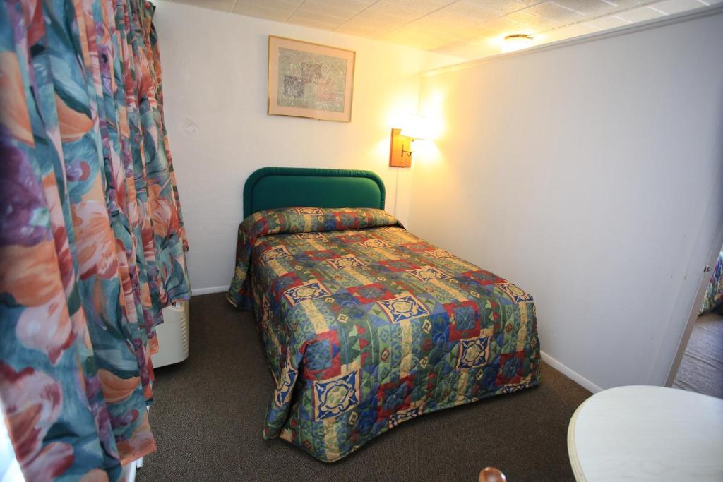 Postel nebo postele na pokoji v ubytování El Ray Motel