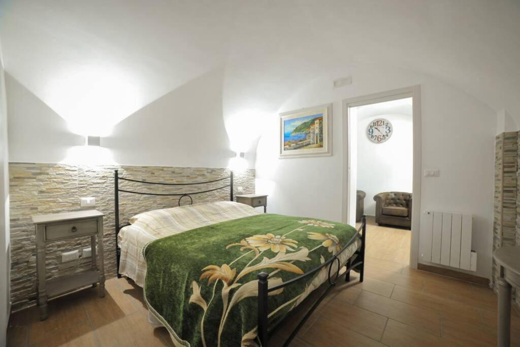 Łóżko lub łóżka w pokoju w obiekcie GaDa Home -centro storico -