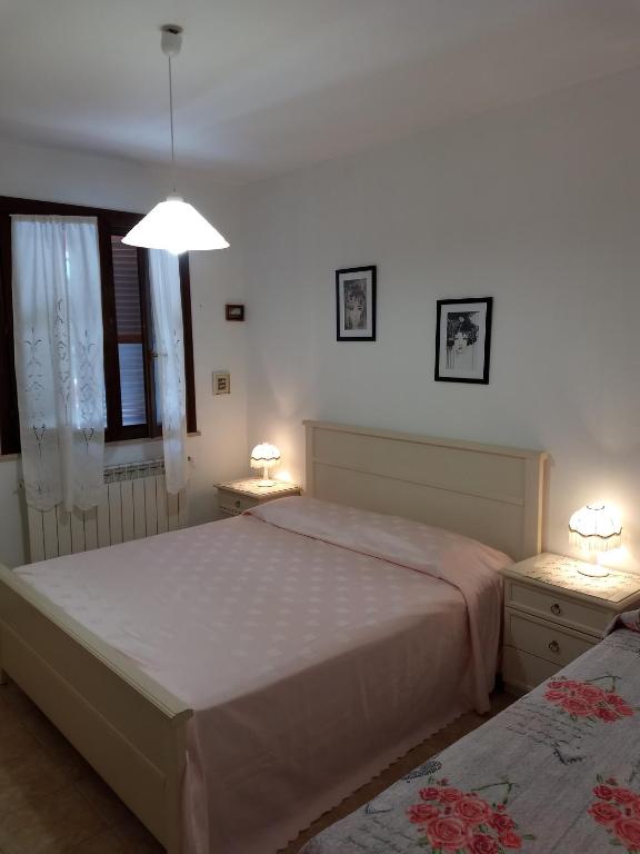 A bed or beds in a room at Appartamenti per vacanze Valle Onesta