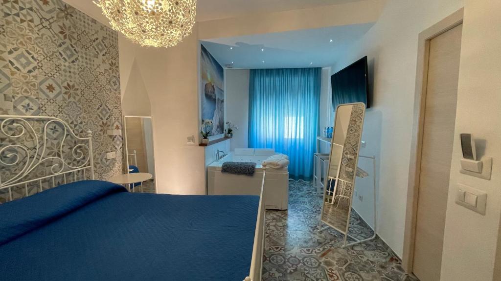 Postel nebo postele na pokoji v ubytování Sa Vivenda Suite