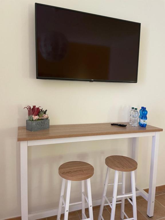 TV a/nebo společenská místnost v ubytování Sa Vivenda Suite