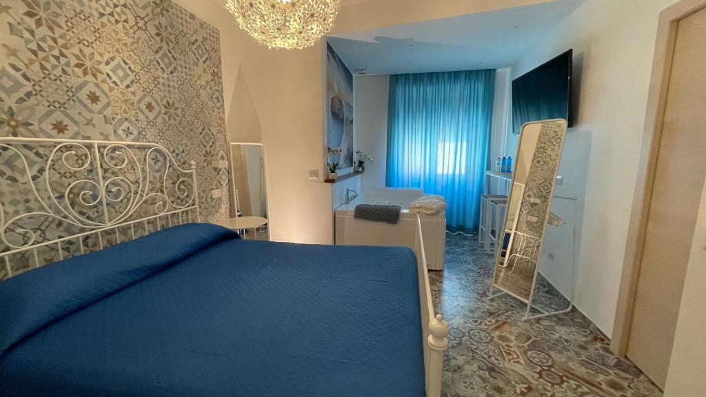 Postel nebo postele na pokoji v ubytování Sa Vivenda Suite