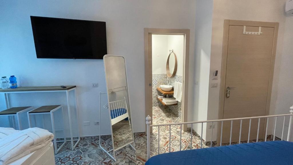 Postel nebo postele na pokoji v ubytování Sa Vivenda Suite