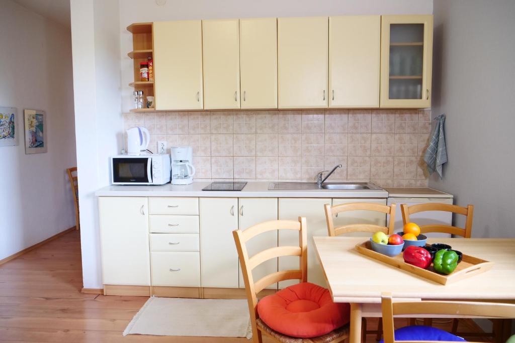 Kuchnia lub aneks kuchenny w obiekcie Apartment and Rooms Vilma