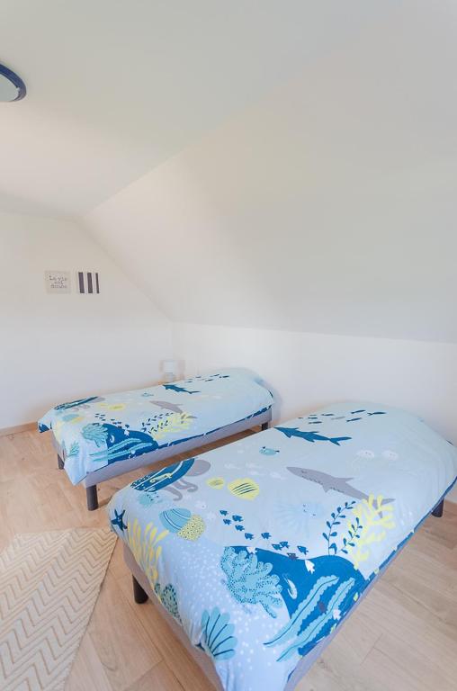 Postel nebo postele na pokoji v ubytování VILLA LA FORT BELLE VUE