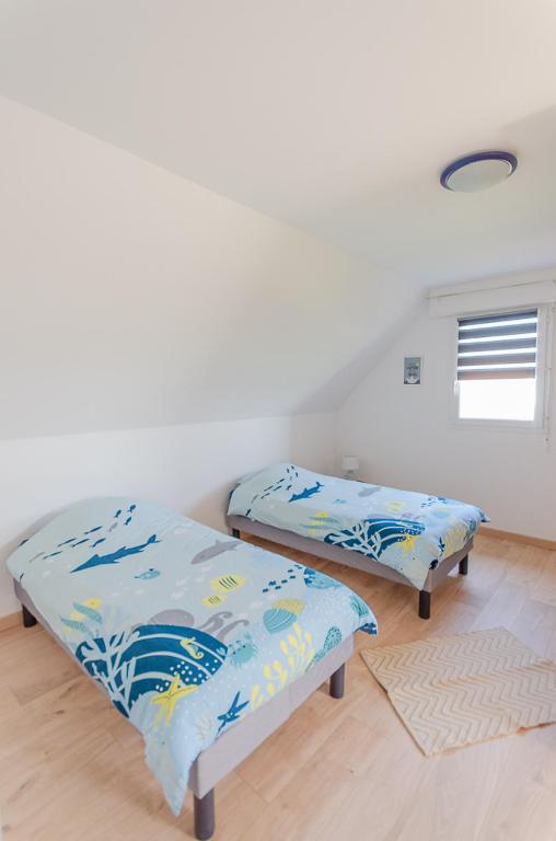 Postel nebo postele na pokoji v ubytování VILLA LA FORT BELLE VUE
