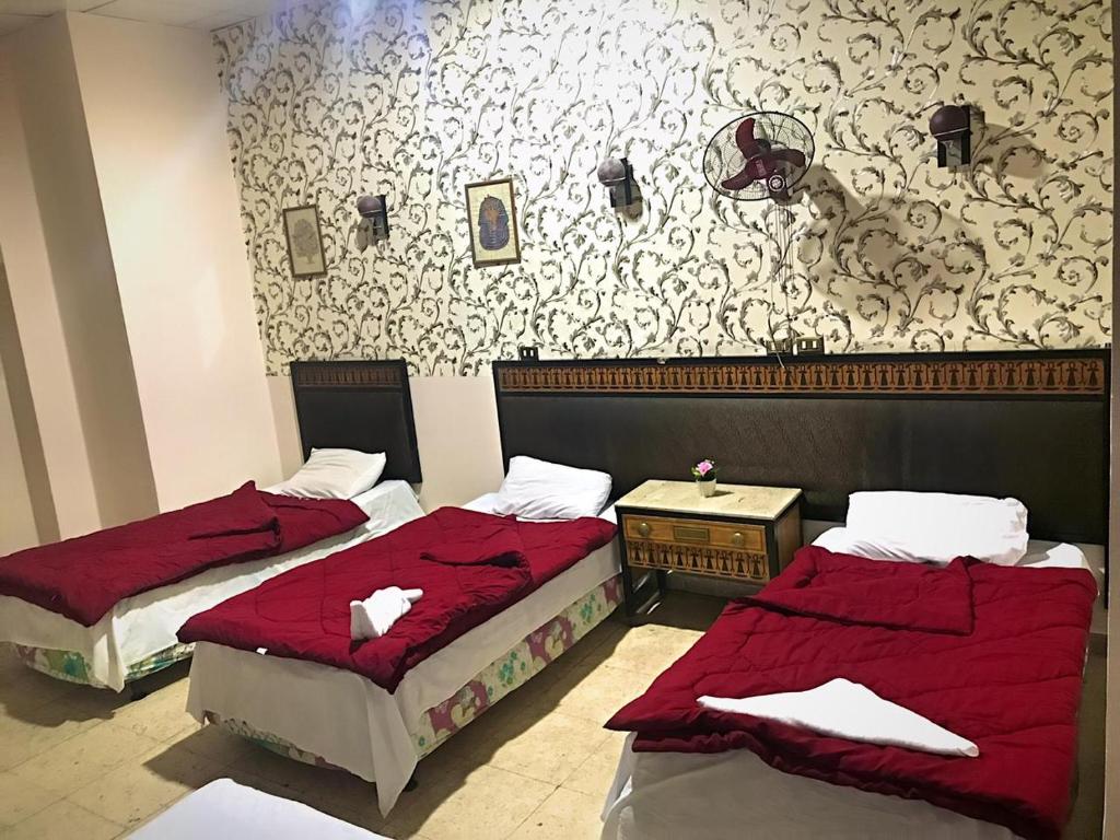 Cama o camas de una habitación en One Season Hostel Cairo