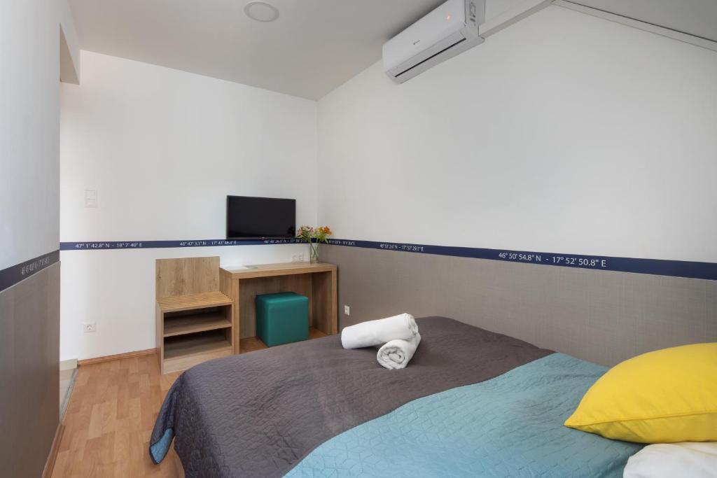 Postel nebo postele na pokoji v ubytování Hotel Solero