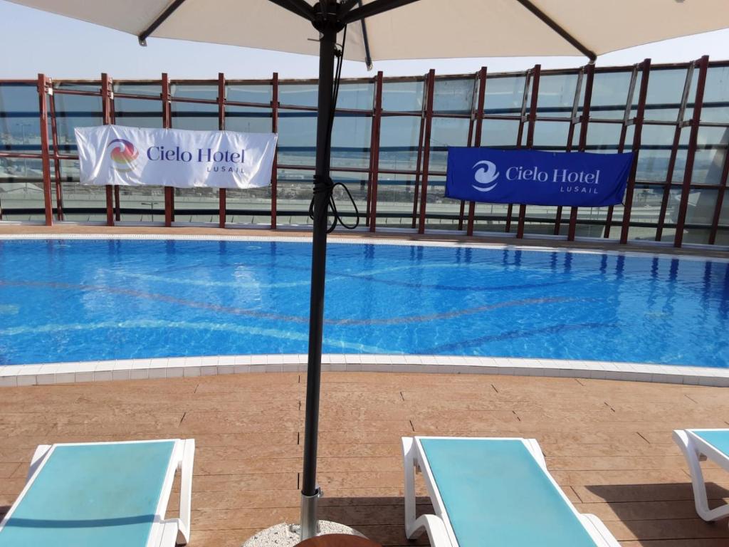 Kolam renang di atau dekat dengan Cielo Hotel Lusail Qatar