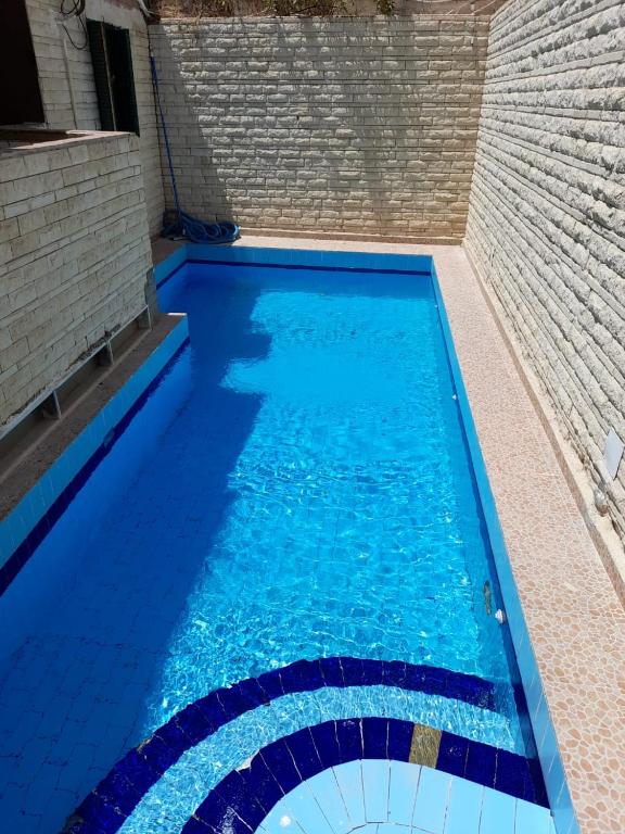 Fotografie z fotogalerie ubytování 3B basement Chalet 4beds 2 bed rooms with pool view114 green beach v destinaci El Alamein