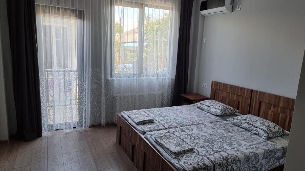 Llit o llits en una habitació de French Hotel