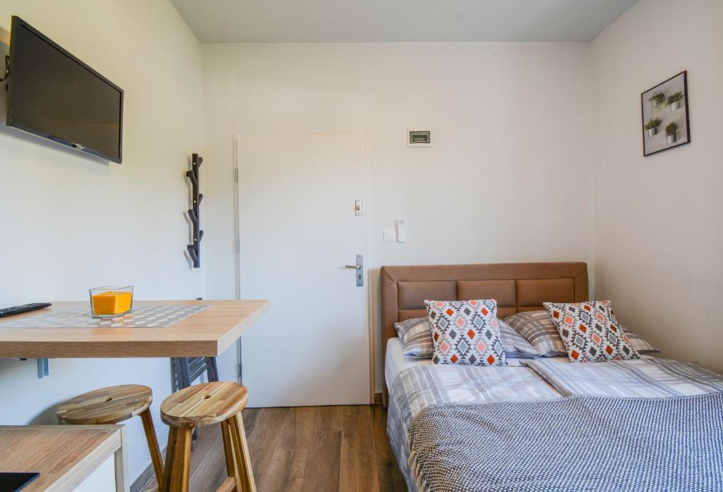 Postel nebo postele na pokoji v ubytování Apartment Piccolo For 2