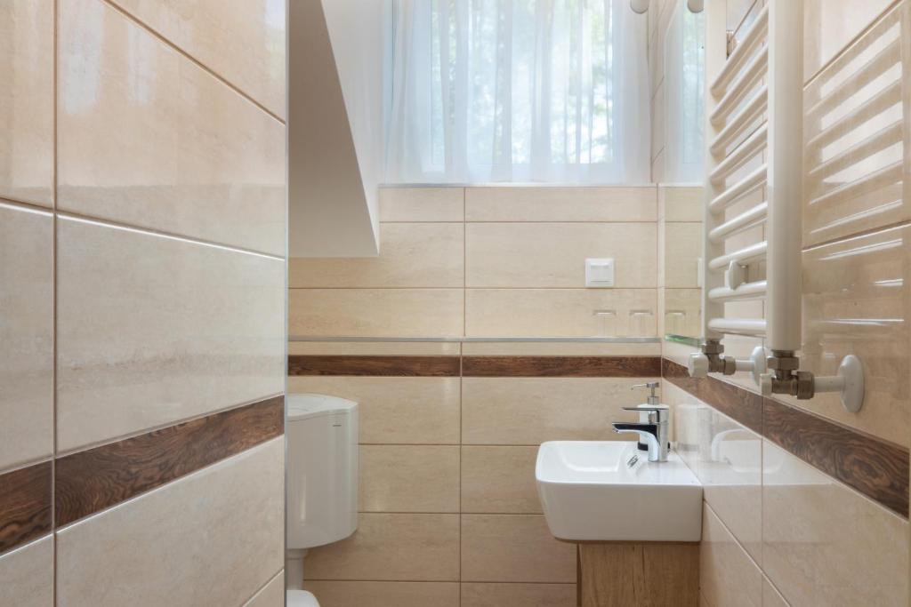 Koupelna v ubytování Hotel Solero