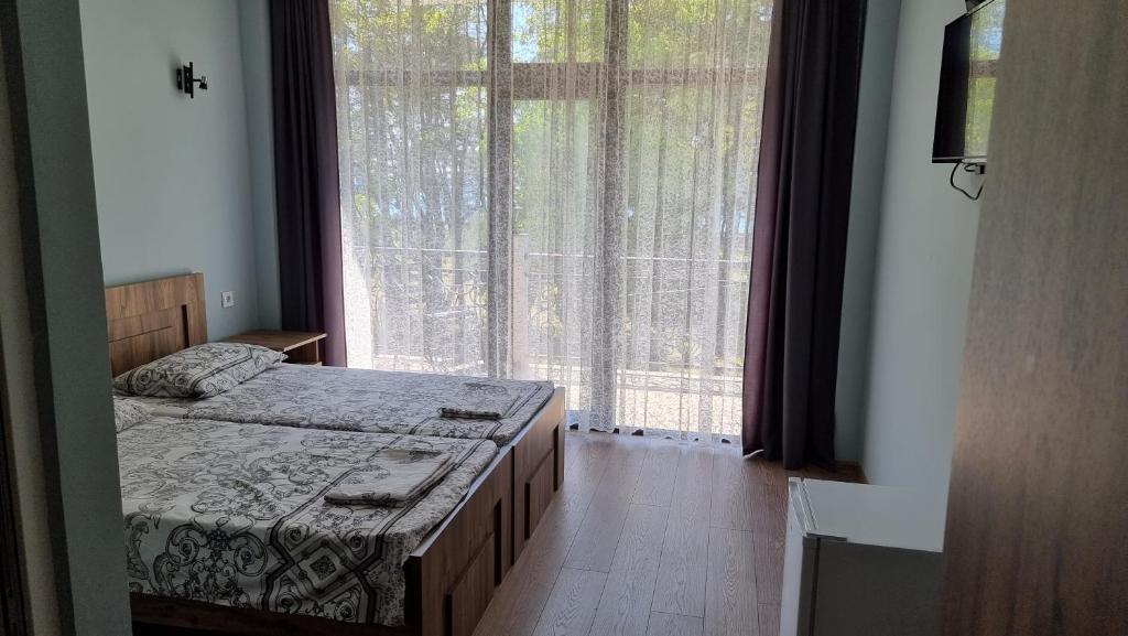 Llit o llits en una habitació de French Hotel
