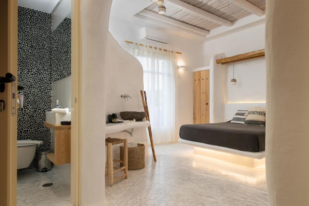 Posteľ alebo postele v izbe v ubytovaní Galini Hotel