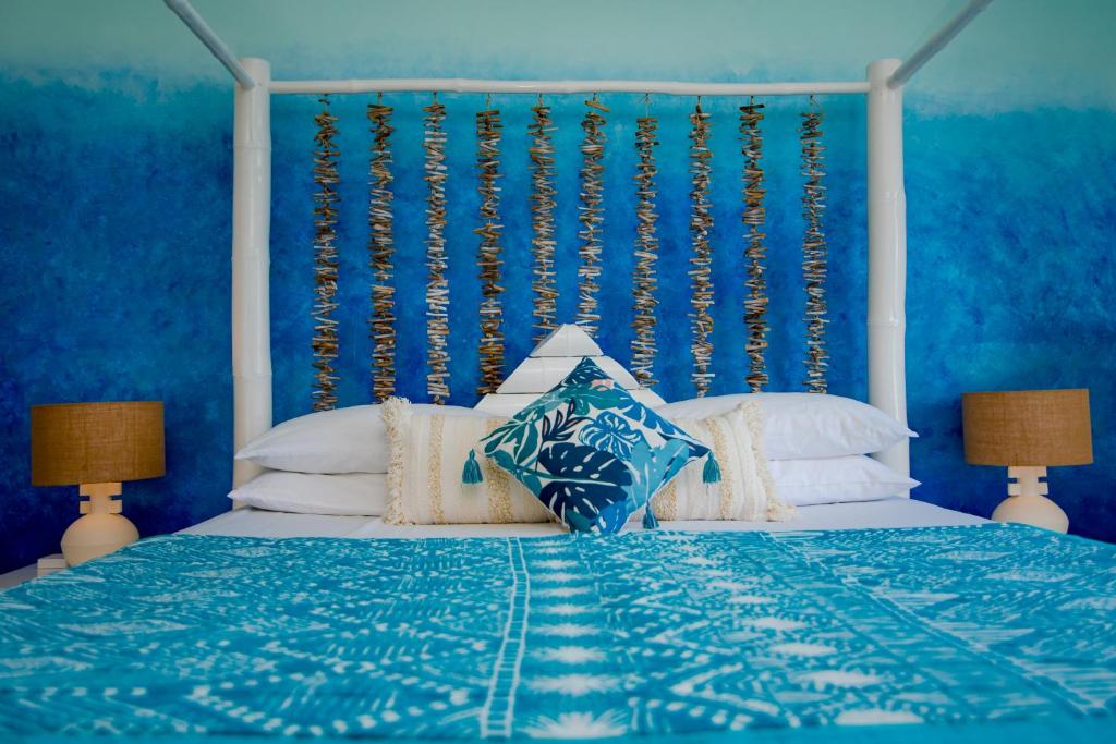 Postel nebo postele na pokoji v ubytování Ocho Rios Penthouse at Whispering Seas