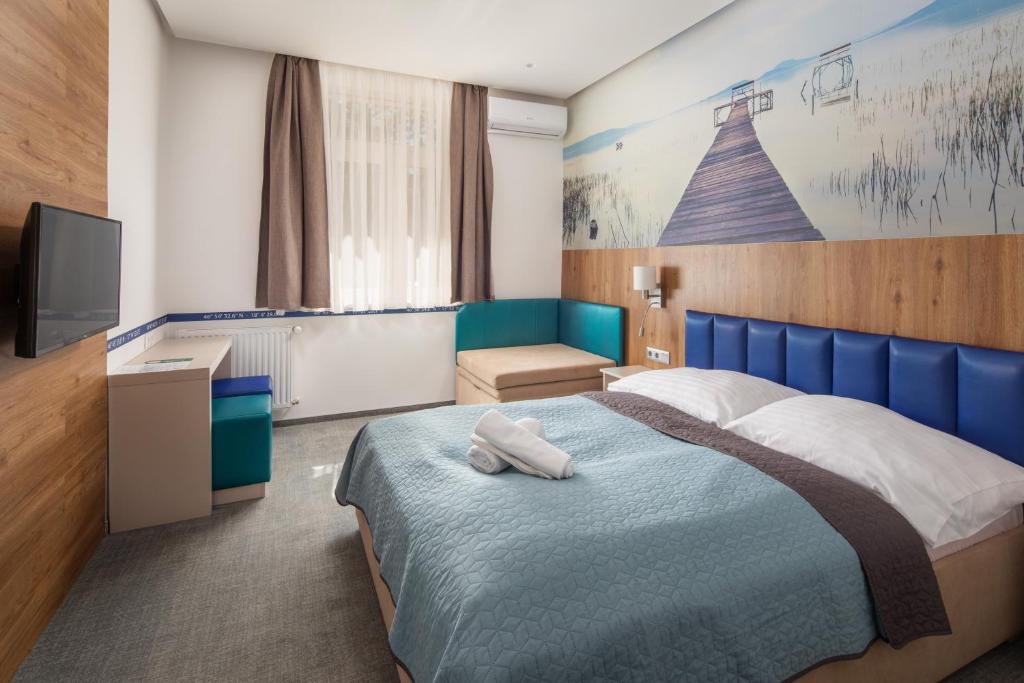 Postel nebo postele na pokoji v ubytování Hotel Solero