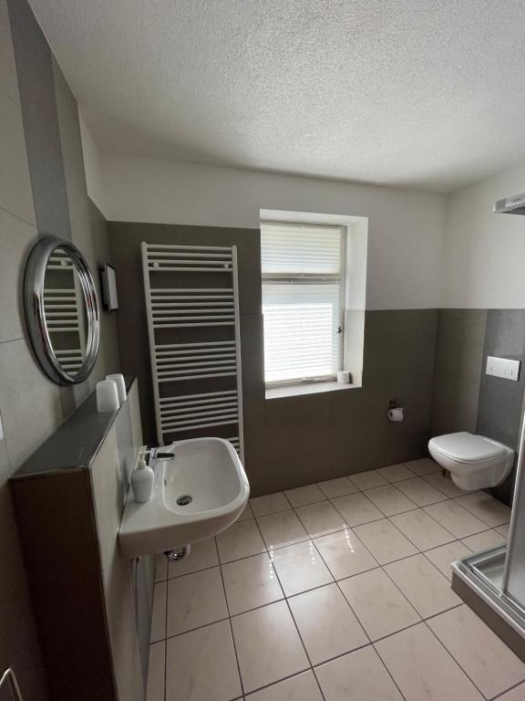 Koupelna v ubytování Hotel Garni „zum Bären“
