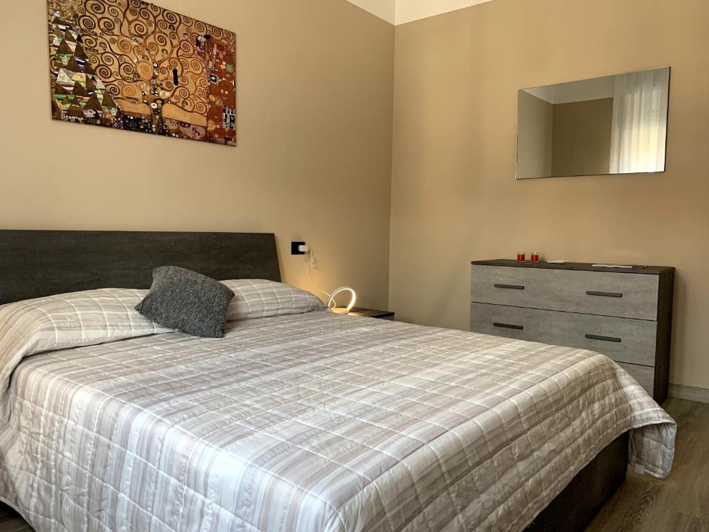 Postel nebo postele na pokoji v ubytování Appartamento Lucia, Lago di Como, Dongo
