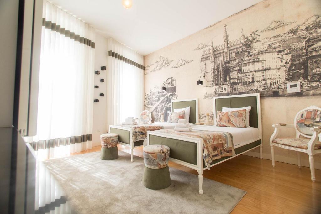 Ένα ή περισσότερα κρεβάτια σε δωμάτιο στο Aliados Downtown Studio by Porto City Hosts