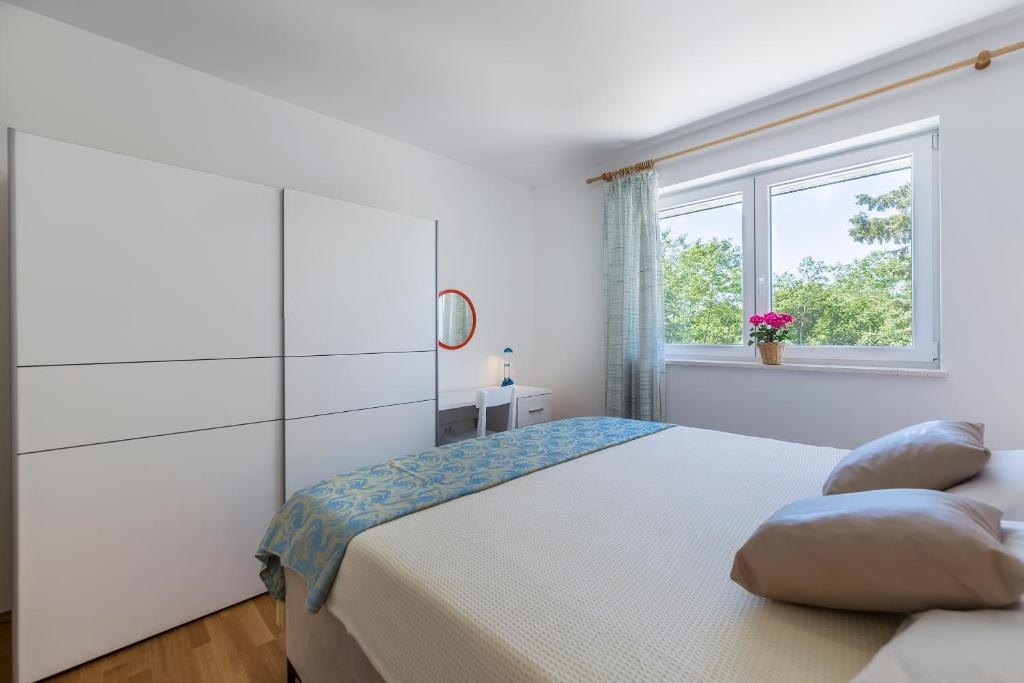 Posteľ alebo postele v izbe v ubytovaní House Katuri 1059