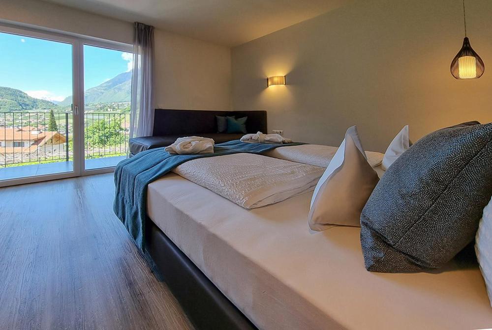 Łóżko lub łóżka w pokoju w obiekcie Apartments Lichtenberg