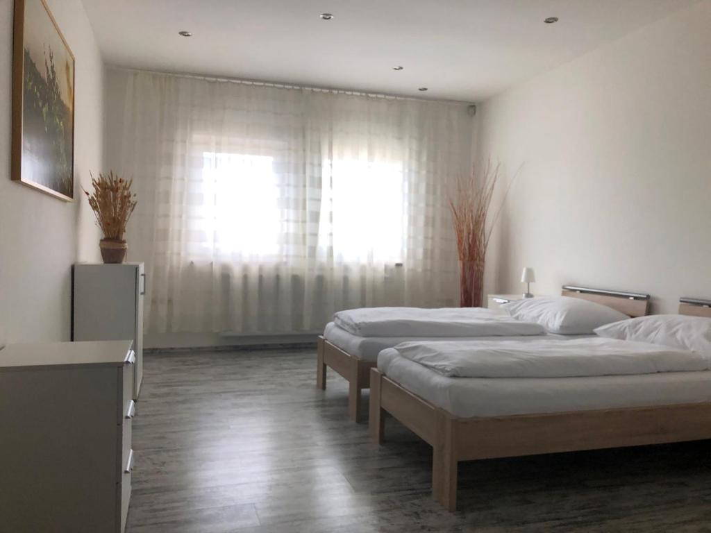 Postel nebo postele na pokoji v ubytování Apartmán Hrušky