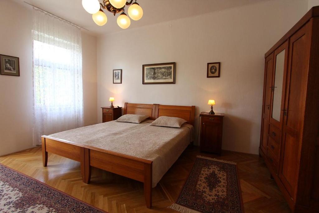 Postel nebo postele na pokoji v ubytování Penzion Jelen Vranov nad Dyjí