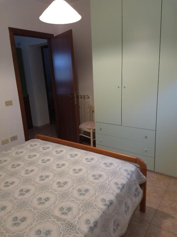 A bed or beds in a room at Appartamenti per vacanze Valle Onesta