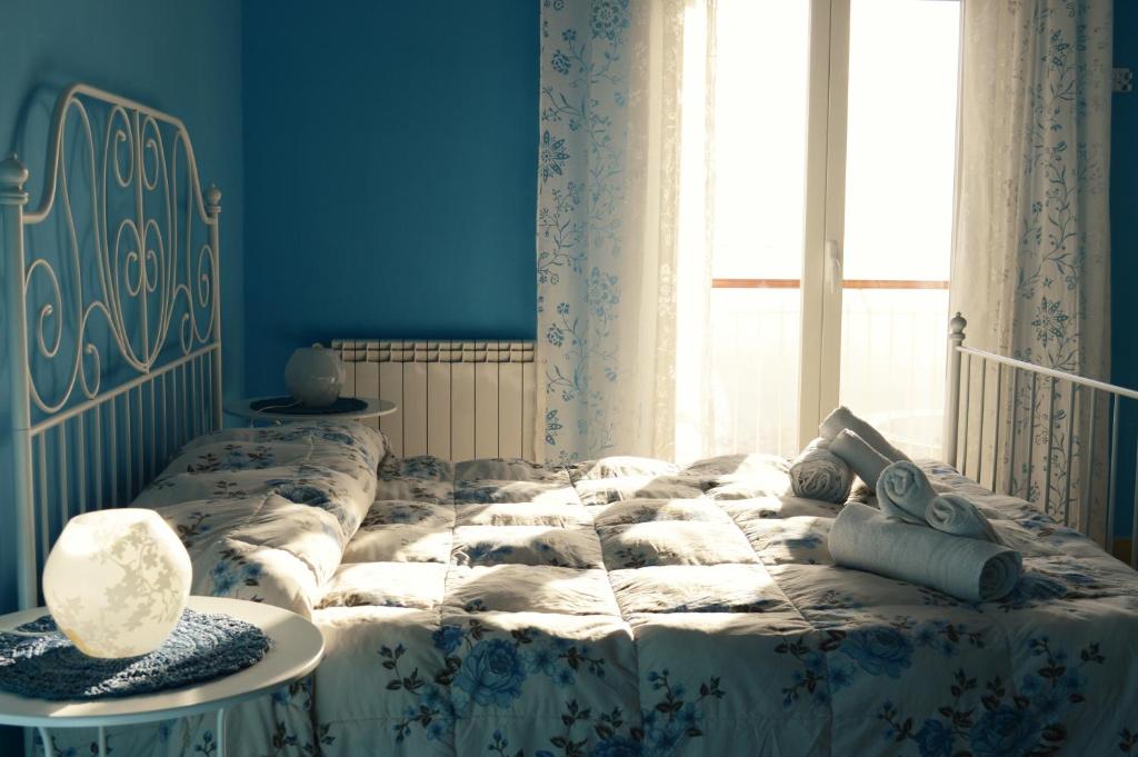 Postel nebo postele na pokoji v ubytování B&B MiraValle Agrigento