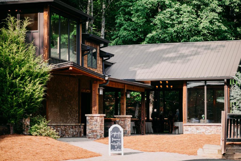 a building with a sign in front of it at Sylvan Valley Lodge and Cellars in Sautee Nacoochee