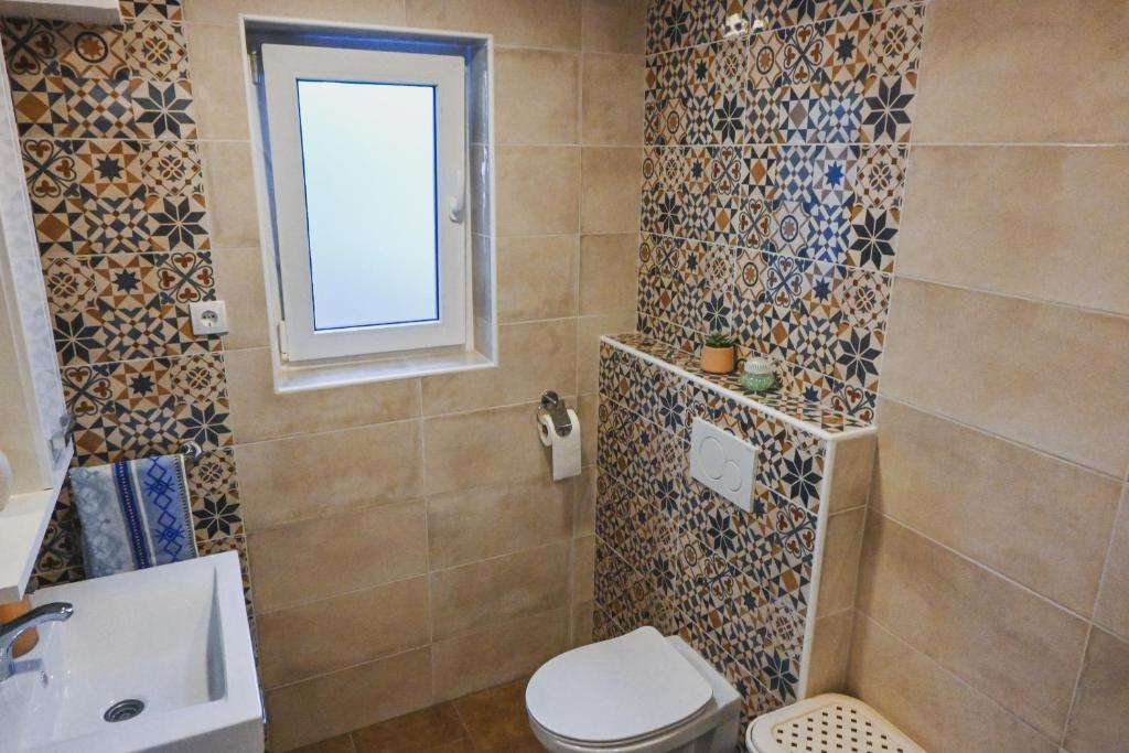 Vannituba majutusasutuses Sobe - rooms R&K
